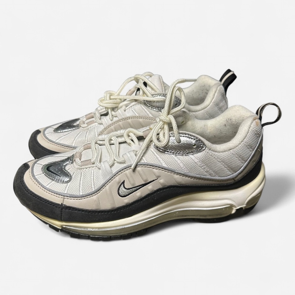 Nike Air Max 98 sneakers in a white and metallic silver color way